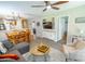 Bright living room featuring hardwood floors, a ceiling fan, and comfortable seating at 227 Pinehurst Ln. # 6D, Pawleys Island, SC 29585