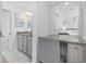 Bathroom vanity area featuring granite countertops and ample storage at 2409 Seabreeze Pl., Myrtle Beach, SC 29577