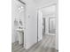 Well-designed powder room featuring elegant fixtures and a pedestal sink at 2409 Seabreeze Pl., Myrtle Beach, SC 29577