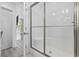 Contemporary shower featuring a sleek glass enclosure and tiled walls, offering a spa-like bathing experience at 2409 Seabreeze Pl., Myrtle Beach, SC 29577