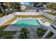 Swimming pool with stone paver surround, palm trees, lounge chairs, and well-maintained landscaping at 2602 Holly Dr., North Myrtle Beach, SC 29582