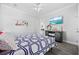 Bedroom with large bed, entertainment center, and decor at 2602 Holly Dr., North Myrtle Beach, SC 29582