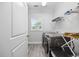 Functional laundry area equipped with modern appliances and ample storage for convenience and organization at 2602 Holly Dr., North Myrtle Beach, SC 29582