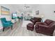 Spacious living room showcasing hardwood floors, comfortable seating, and a relaxed atmosphere at 2602 Holly Dr., North Myrtle Beach, SC 29582