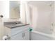 Bathroom features a tub, shower and modern vanity at 2801 South Ocean Blvd. # 335, North Myrtle Beach, SC 29582