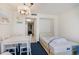 Bright bedroom featuring a bed, side tables, and access to the kitchen at 2801 South Ocean Blvd. # 335, North Myrtle Beach, SC 29582