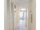 Hallway with tiled flooring leading to dining area and bedroom at 2801 South Ocean Blvd. # 335, North Myrtle Beach, SC 29582