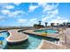 Resort-style outdoor pool and lazy river featuring brick paver decking and lounge chairs, perfect for relaxation at 2801 South Ocean Blvd. # 335, North Myrtle Beach, SC 29582