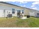 Backyard area with an outdoor patio, lawn and views of neighboring houses at 295 Brackish Dr. # 673, Myrtle Beach, SC 29588