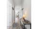 Bright hallway with stylish decor, leading to the living area of the home at 295 Brackish Dr. # 673, Myrtle Beach, SC 29588