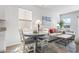 Open concept living area with dining space, comfortable seating, and natural light at 295 Brackish Dr. # 673, Myrtle Beach, SC 29588