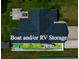 Aerial view of the backyard reveals boat and/or RV parking at 305 Blue Rock Dr., Longs, SC 29568