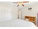 Bright bedroom with neutral walls, a spacious closet, and a simple decor, creating a tranquil atmosphere at 305 Blue Rock Dr., Longs, SC 29568