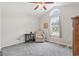 Bright bedroom featuring vaulted ceiling, ceiling fan, and a window that provides natural light and a view of the outside at 305 Blue Rock Dr., Longs, SC 29568