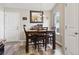 Inviting breakfast nook with a modern chandelier and beautiful natural light at 305 Blue Rock Dr., Longs, SC 29568
