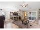 Spacious open floor plan with a kitchen, dining area, living room, and seamless indoor-outdoor flow at 305 Blue Rock Dr., Longs, SC 29568