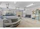 Well-lit garage with car and storage, providing secure parking and organization at 321 Heather Ct., Sunset Beach, NC 28468