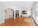Open floor plan showing hardwood floors and arched entryways with natural light throughout at 321 Heather Ct., Sunset Beach, NC 28468
