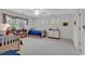 Spacious bedroom with two twin beds, built-in shelving, and large windows at 356 Chapman Loop, Pawleys Island, SC 29585