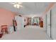 Large bonus room featuring built-in bookshelves, neutral carpeting, and ample natural light at 356 Chapman Loop, Pawleys Island, SC 29585