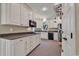 Modern kitchen with white cabinets and granite countertops at 356 Chapman Loop, Pawleys Island, SC 29585