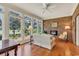 Bright sun room with brick accent wall and large windows at 356 Chapman Loop, Pawleys Island, SC 29585