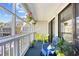 Cozy balcony with vibrant seating and charming floral accents, perfect for relaxation at 3700 Golf Colony Lane # 18-G, Little River, SC 29566