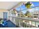 Balcony featuring outdoor seating, potted plants, and a view of the pool at 3700 Golf Colony Lane # 18-G, Little River, SC 29566