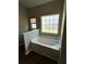 Bright bathroom with soaking tub, large window, and neutral finishes at 388 Carriage Lake Dr., Little River, SC 29566