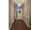 Inviting foyer with wood flooring and a decorative light fixture at 388 Carriage Lake Dr., Little River, SC 29566