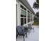 A patio with outdoor seating featuring large windows providing ample natural light at 388 Carriage Lake Dr., Little River, SC 29566