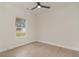 Bright bedroom featuring hardwood floors, a modern ceiling fan, and a window with a view at 4010 Macks Rd, Aynor, SC 29511