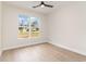 This cozy bedroom features a large window with views of the neighborhood at 4010 Macks Rd, Aynor, SC 29511