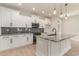 Modern kitchen boasts stainless appliances, subway tile backsplash, and granite countertops with an island at 4010 Macks Rd, Aynor, SC 29511