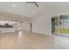 Bright living room with light wood floors and recessed lighting at 4010 Macks Rd, Aynor, SC 29511