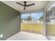 Covered patio featuring a ceiling fan and views of the home's yard at 4010 Macks Rd, Aynor, SC 29511