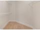 Walk-in closet with wire shelving and light wood-look flooring at 4010 Macks Rd, Aynor, SC 29511