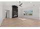 Spacious living room featuring a modern fireplace and large windows at 4016 Macks Rd, Aynor, SC 29511