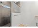 Modern shower boasts sleek fixtures, elegant tile work and a glass door at 4016 Macks Rd, Aynor, SC 29511