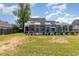 Expansive backyard featuring an enclosed in-ground pool at 403 Brandymill Blvd, Myrtle Beach, SC 29588