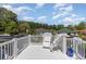 Spacious white balcony overlooking the neighborhood with outdoor seating at 403 Brandymill Blvd, Myrtle Beach, SC 29588