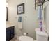 Bathroom featuring vanity, a framed mirror, and decorative shelving at 403 Brandymill Blvd, Myrtle Beach, SC 29588