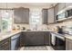 This kitchen has granite countertops, stainless steel appliances and great lighting at 403 Brandymill Blvd, Myrtle Beach, SC 29588