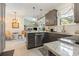 This is a cozy kitchen that features granite countertops, and stainless steel appliances at 403 Brandymill Blvd, Myrtle Beach, SC 29588