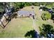 Overhead view of a single-Gathering home with sprawling green lawn and driveway parking at 408 South Farr Ave., Andrews, SC 29510