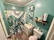 Charming bathroom featuring a vanity sink and a shower with a lively octopus-themed curtain at 408 South Farr Ave., Andrews, SC 29510