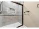 Sleek bathroom featuring a glass shower enclosure and bronze fixtures at 409 14Th Ave. S, North Myrtle Beach, SC 29582