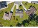 Aerial view of a meticulously landscaped residence on a cul-de-sac with mature trees at 414 Staghorn Ln., Longs, SC 29568