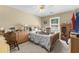 Bedroom featuring neutral wall colors, a window view and traditional decor at 414 Staghorn Ln., Longs, SC 29568