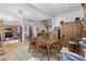 Open dining area with hardwood floors, neutral paint, and seamless flow to the kitchen and living areas at 414 Staghorn Ln., Longs, SC 29568